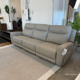 Ashley Furniture Salerno power reclining sofa set with three pieces, featuring plush cushions and reclining seats for comfort.
