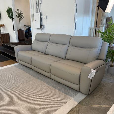 Ashley Furniture Salerno power reclining sofa set with three pieces, featuring plush cushions and reclining seats for comfort.