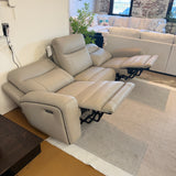 Ashley Furniture Salerno Power Reclining Sofa, a 3-piece sectional with plush fabric and reclining features, shown in a modern living room setting.