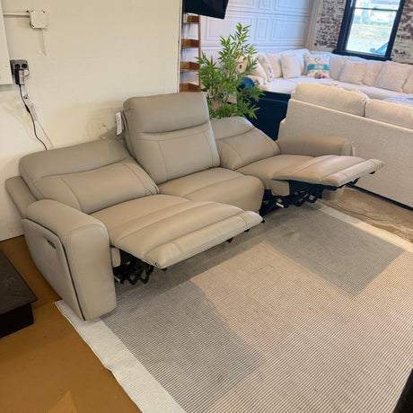 Ashley Furniture Salerno Power Reclining Sofa, 3-piece set, featuring plush cushions and reclining mechanisms for comfortable lounging.