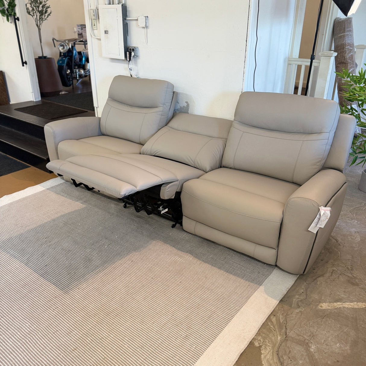 Ashley Furniture Salerno Power Reclining Sofa, a 3-piece sectional with plush cushions and reclining seats for relaxing comfort.