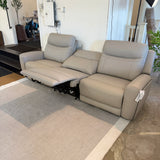 Ashley Furniture Salerno Power Reclining Sofa, a 3-piece sectional with plush cushions and reclining seats for relaxing comfort.