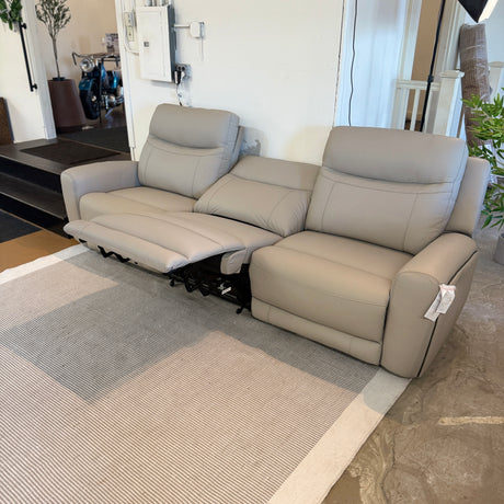 Ashley Furniture Salerno Power Reclining Sofa, a 3-piece sectional with plush cushions and reclining seats for relaxing comfort.