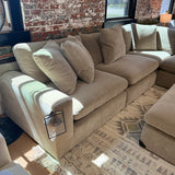 Ashley Furniture Nova Cloud 4-piece corner sectional with plush cushions and modern design, shown in a cozy living room setting.