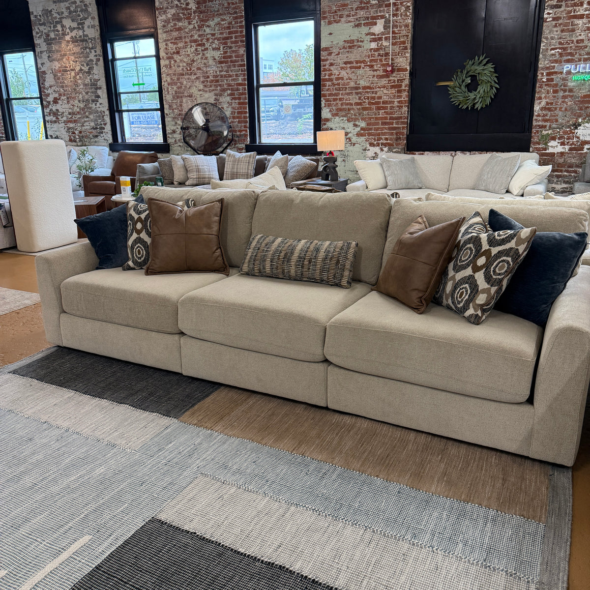 Behold Home Sequoia 3-piece sectional sofa with plush cushions and modern design, shown in a spacious living room setting.