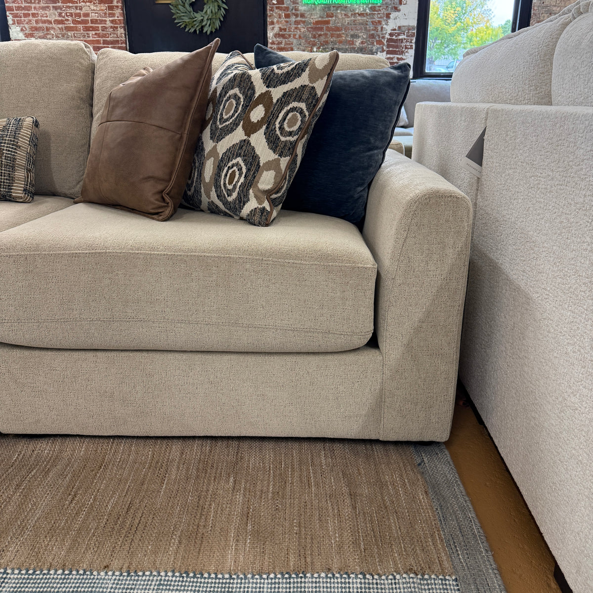 Behold Home Sequoia Sectional Sofa in neutral fabric, showing three interconnected sections with plush cushions and modern design.
