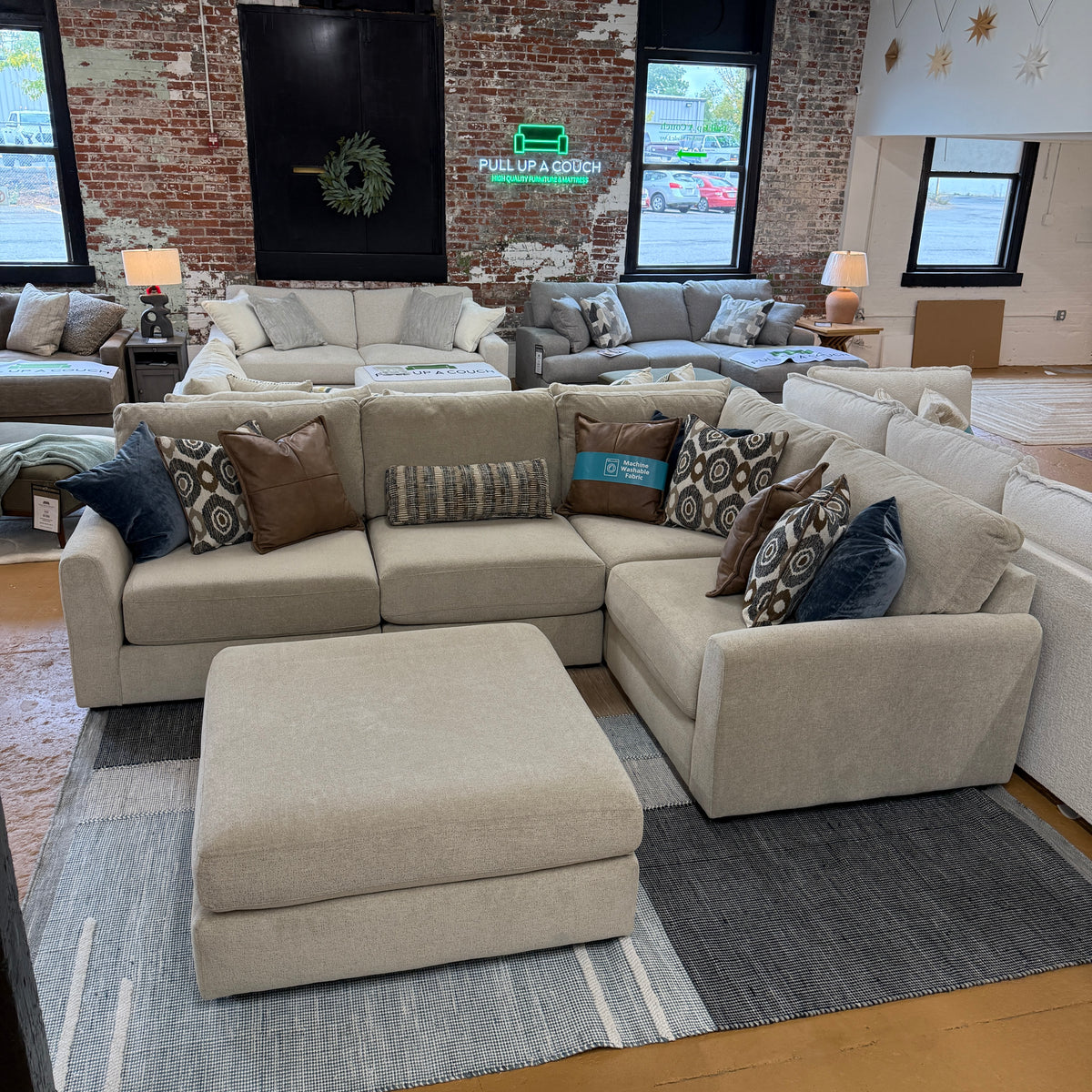 Behold Home Sequoia Accent Ottoman with wooden legs and soft fabric upholstery, ideal for living room or bedroom decor.