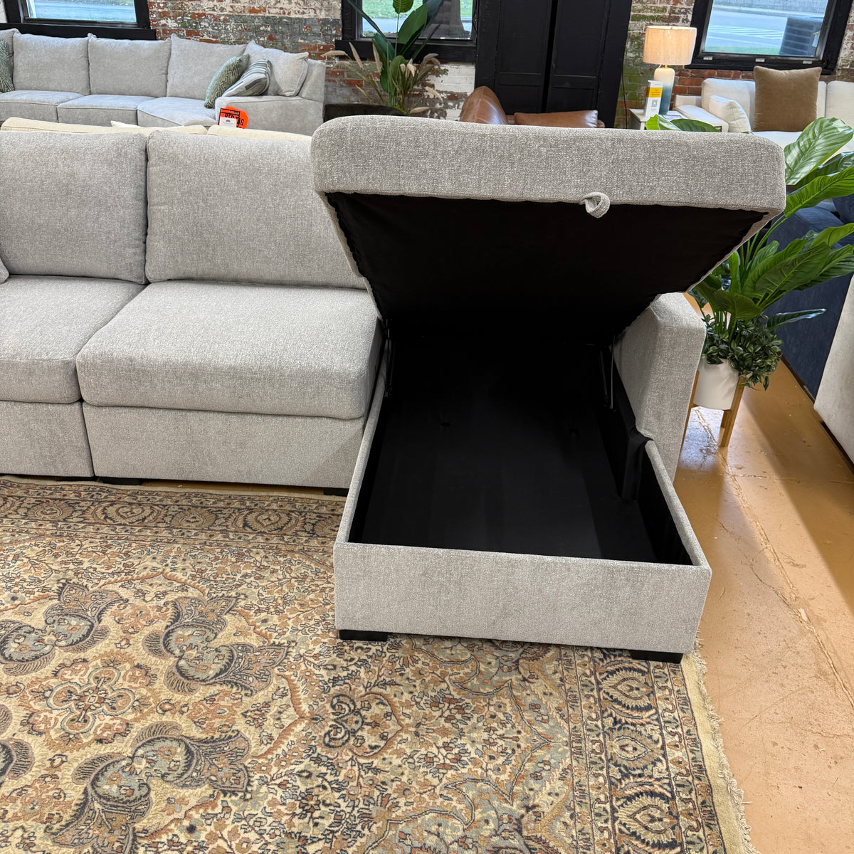Ashley Furniture Haven 3-piece sectional with chaise showing plush fabric upholstery and modern design in a cozy living room setting.