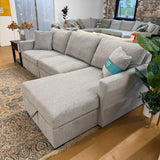 Ashley Furniture Haven 3-piece sectional with chaise, showcasing plush fabric upholstery and modern design in a spacious living room setting.
