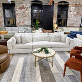Ashley Furniture Alpine 3-piece sectional sofa with plush cushions and modern design, shown in a cozy living room setting.