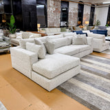 Ashley Furniture Alpine 3-piece sectional with chaise, featuring plush cushions and a modern design for comfortable living space.