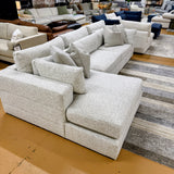 Ashley Furniture Alpine 3-piece sectional with chaise, showcasing plush fabric, modern design, and comfortable seating arrangement.