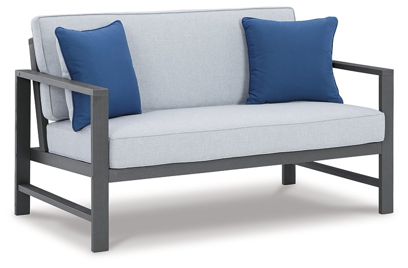 Fynnegan Outdoor Loveseat with Table (Set of 2) - Pull Up A Couch