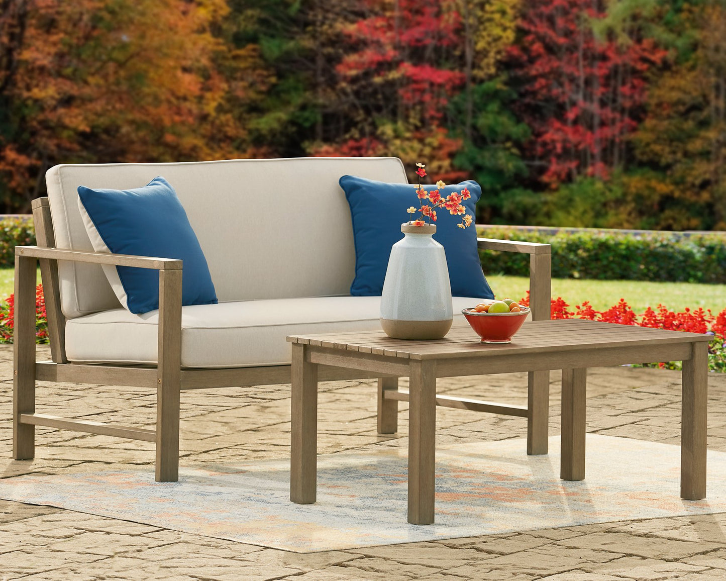 Fynnegan Outdoor Loveseat with Table (Set of 2) - Pull Up A Couch