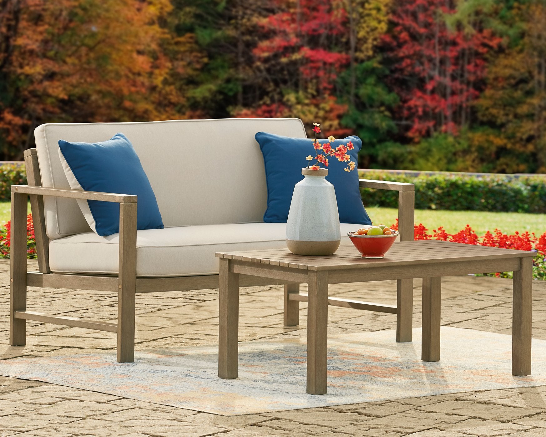 Fynnegan Outdoor Loveseat with Table (Set of 2) - Pull Up A Couch