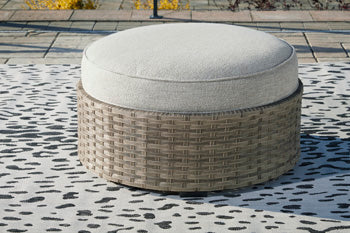 Calworth Outdoor Ottoman with Cushion - Pull Up A Couch