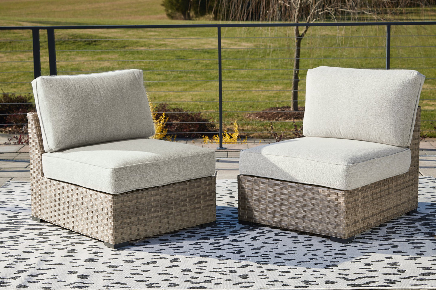 Calworth Outdoor Armless Chair with Cushion (Set of 2) - Pull Up A Couch