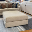 Behold Home Sequoia Accent Ottoman with wooden legs and plush fabric upholstery, ideal as a stylish footstool or side table.