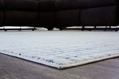 Beckfille 5' x 7' Rug - Pull Up A Couch