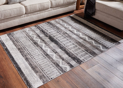 Henchester 8' x 10' Rug - Pull Up A Couch