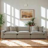 Modern Nova Cloud 3-piece sectional sofa by Ashley Furniture, featuring plush cushions and modular design in a neutral fabric.