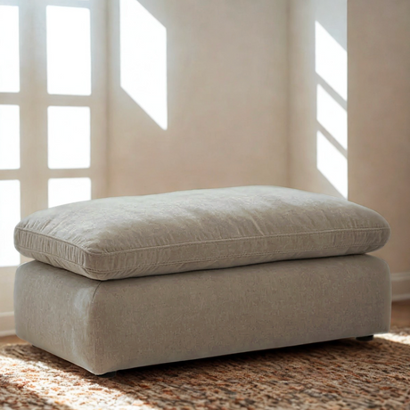 Ashley Furniture Nova Cloud Ottoman featuring a soft, plush fabric and modern design, perfect for living room seating or decor.