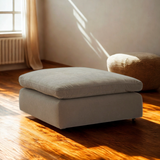 Large Nova Cloud Oversized Ottoman by Ashley Furniture, featuring soft fabric and plush cushioning, ideal for living room decor.