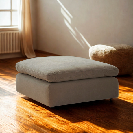 Large Nova Cloud Oversized Ottoman by Ashley Furniture, featuring soft fabric and plush cushioning, ideal for living room decor.