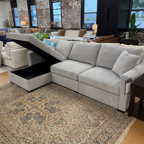 Ashley Furniture Haven 3-piece sectional with chaise, showing plush fabric upholstery and modern design in a living room setting.