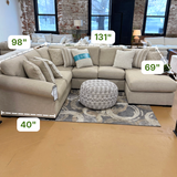 Ashley Furniture Lennox corner sectional with chaise, featuring plush upholstery and a modern design for comfortable living spaces.