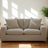Ashley Furniture Nova Cloud Loveseat with plush cushions and modern design, shown in a cozy living room setting.