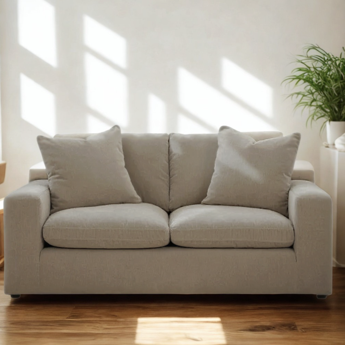 Ashley Furniture Nova Cloud Loveseat with plush cushions and modern design, shown in a cozy living room setting.