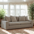 Ashley Furniture Nova Cloud Sofa in a modern living room, showcasing plush cushions and sleek design.