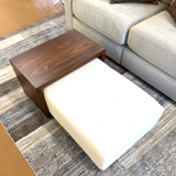 Pull Up A Couch Stafford Ottoman with castered table, featuring a cushioned top and stylish wooden legs for versatile living room use.