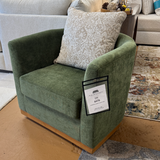 Ashley Furniture Jersonlow swivel chair with a modern design, featuring a cushioned seat and backrest in a neutral fabric.