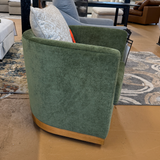 Ashley Furniture Jersonlow swivel chair with cushioned seat and backrest, featuring a modern design and sturdy base.