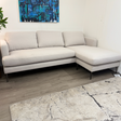 Article 93-inch sectional sofa with a reversible chaise, featuring plush cushions and modern design in a stylish living room setting.