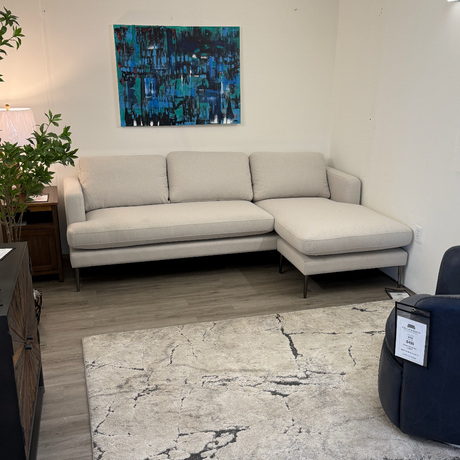 Photo of a 93-inch Article sectional sofa with a reversible chaise, showcasing its modern design and comfortable seating.