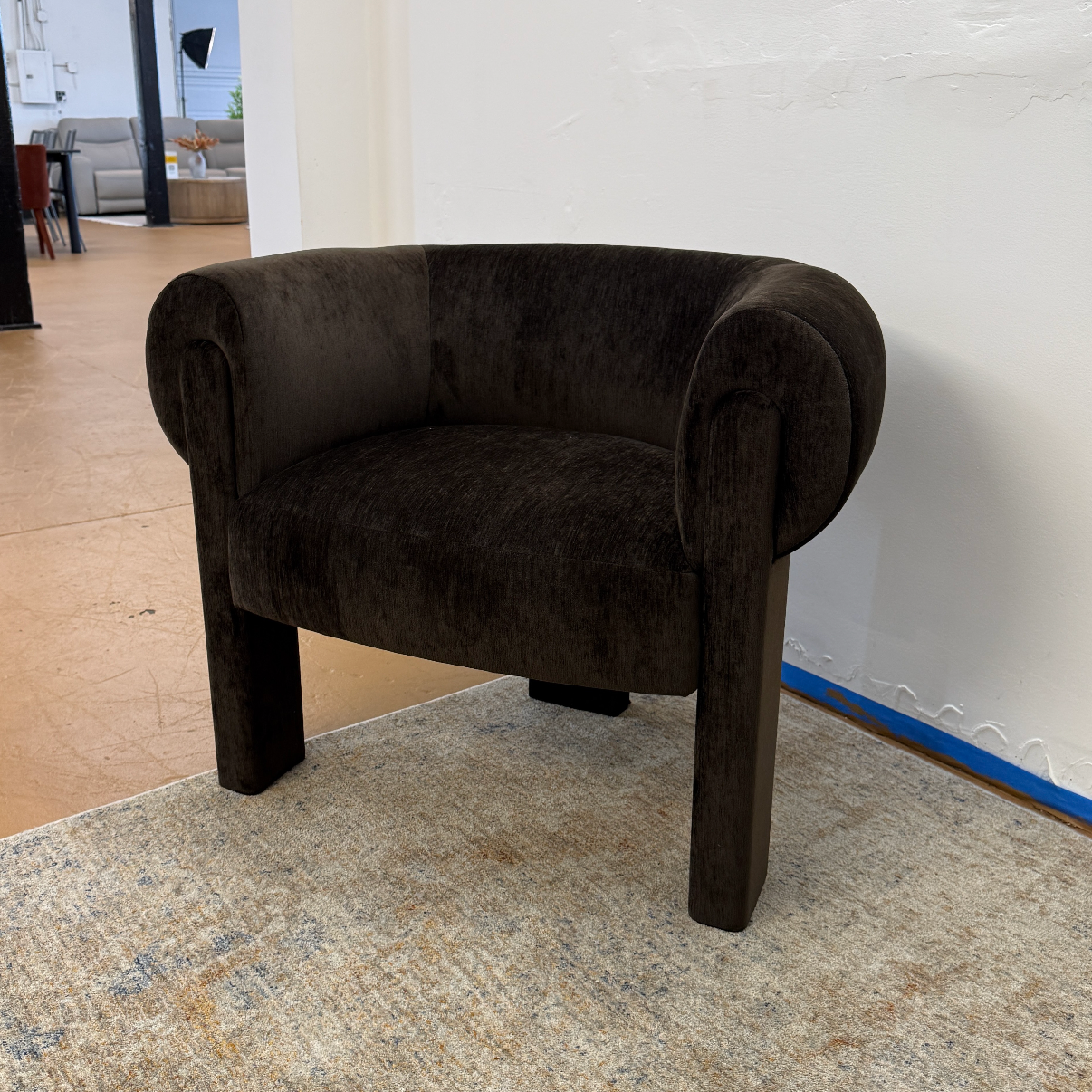Espresso brown velvet MCM lounge chair by Article with sleek modern design and plush cushioning for comfortable seating.