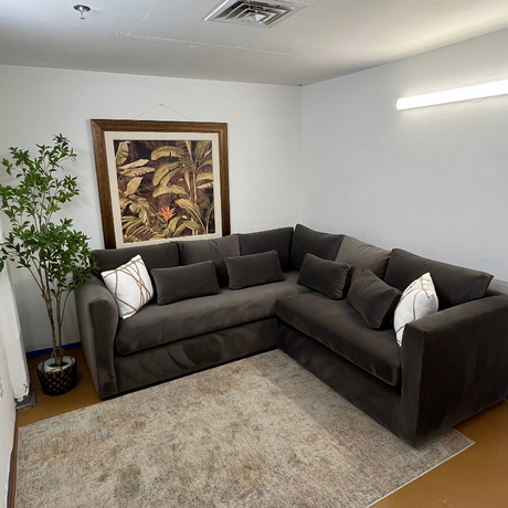 Hale Warm Gray 92-inch velvet sectional sofa by Article, featuring plush cushions and a modern corner design in a cozy living space.