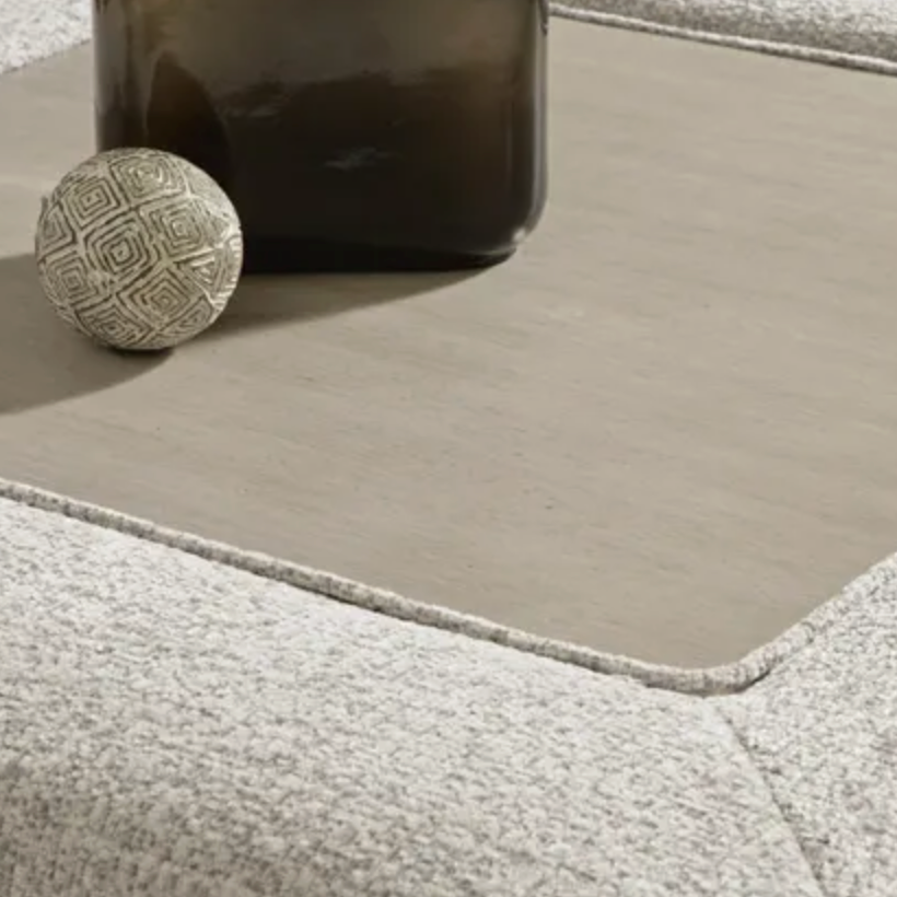 Alpine oversized ottoman by Ashley Furniture featuring plush fabric and a large, comfortable surface for living room use.