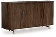 Ashley Furniture Amickly Accent Cabinet with wood finish and storage drawers, stylish and functional for living room decor.