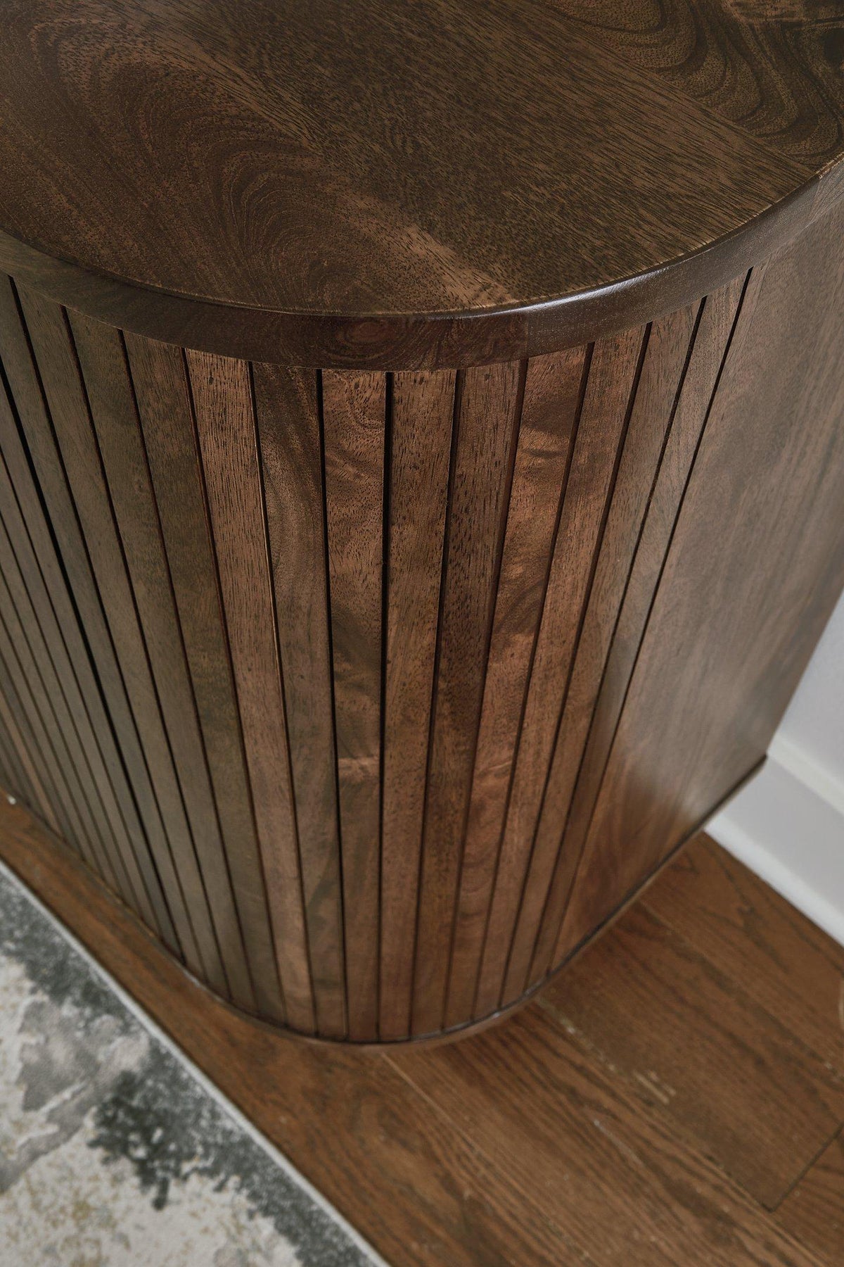Ashley Furniture Amickly Accent Cabinet with wooden finish and storage drawers, ideal for living room or hallway decor.