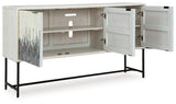 Ashley Furniture Freyton Accent Cabinet with wood finish and modern design, featuring storage drawers and decorative surface.