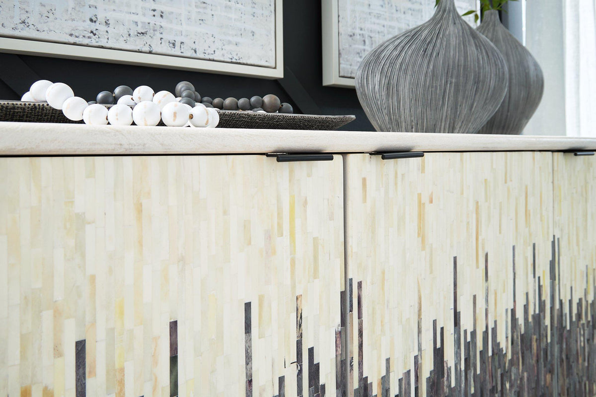 Ashley Furniture Freyton Accent Cabinet with wood finish and sleek design, featuring storage drawers and decorative top surface.