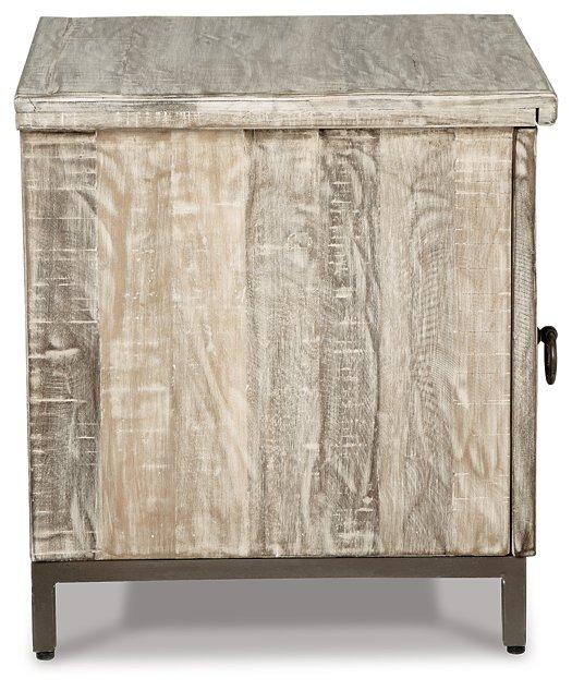 Ashley Furniture Laddford Accent Cabinet with wood finish and decorative hardware, ideal for stylish home storage.
