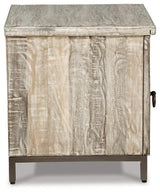 Ashley Furniture Laddford Accent Cabinet with wood finish and decorative hardware, ideal for stylish home storage.