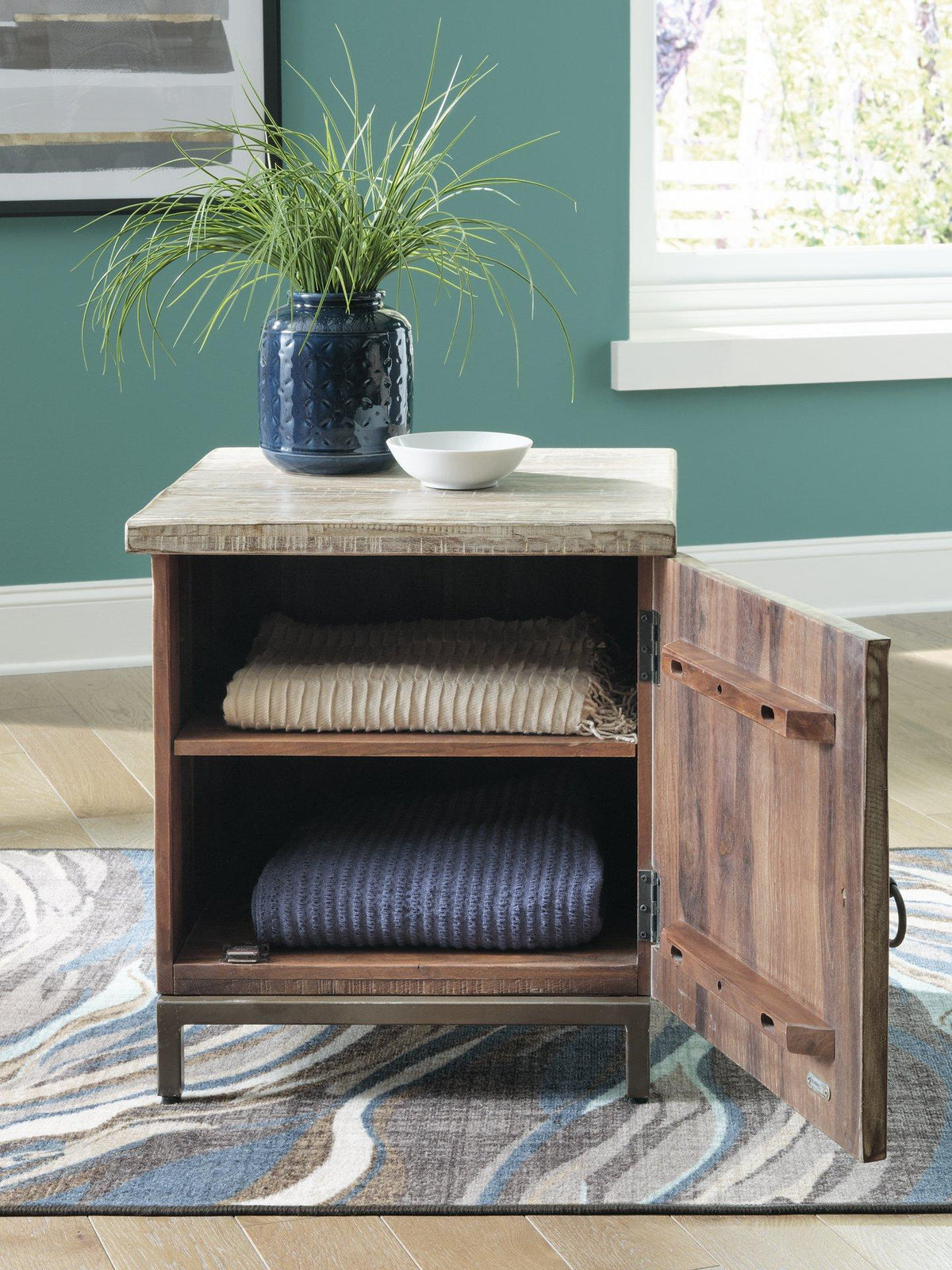 Ashley Furniture Laddford Accent Cabinet with wood finish, featuring storage drawers and a stylish design for living spaces.