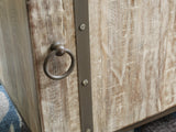Ashley Furniture Laddford Accent Cabinet with wood finish and stylish design, perfect for living room or entryway decor.