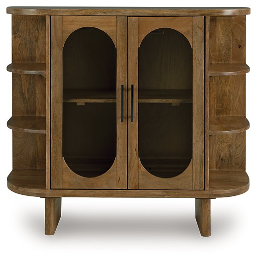 Niall Accent Cabinet by Ashley Furniture featuring a sleek wood finish and modern design with cabinet doors and metal handles.